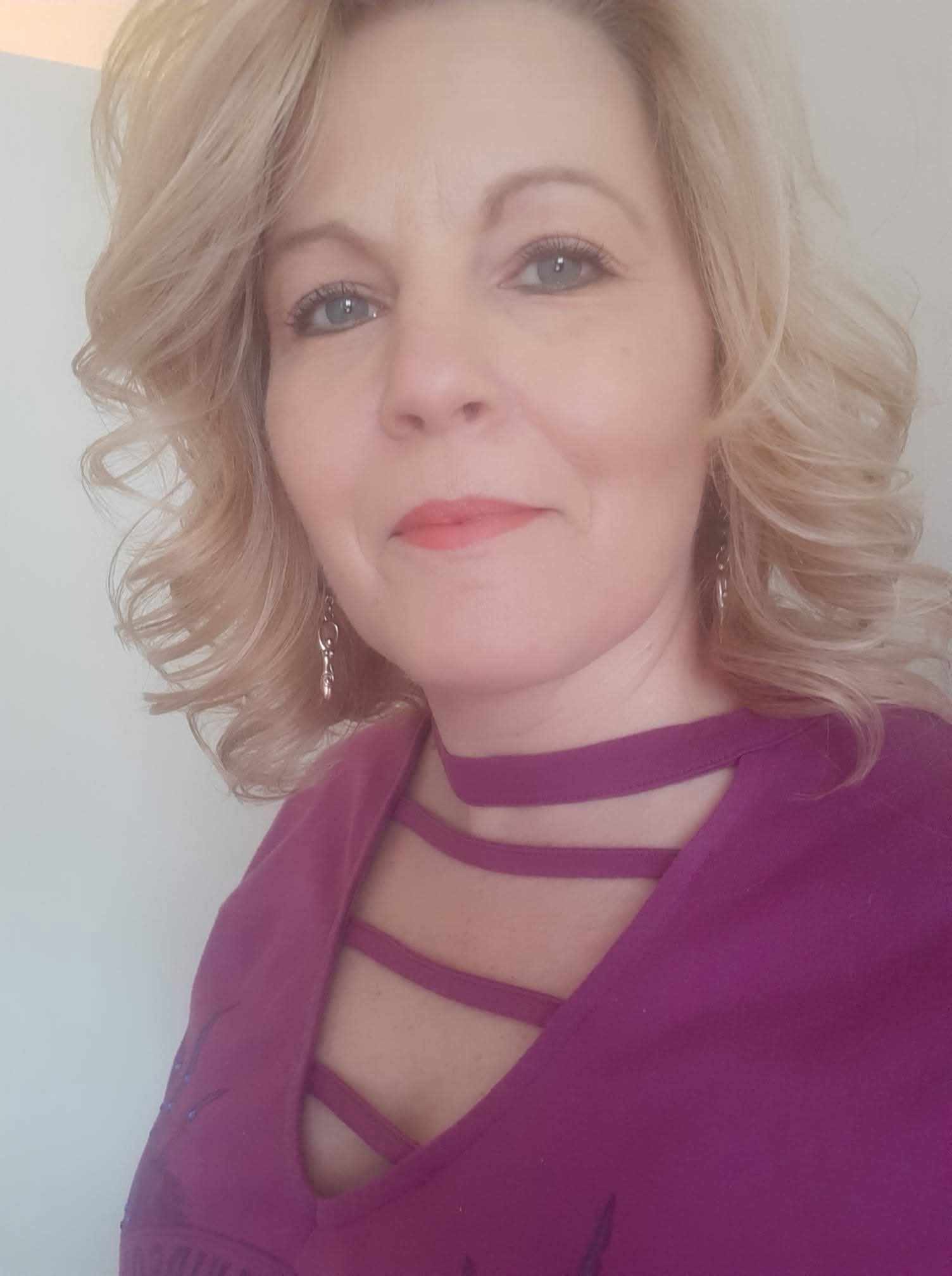 Cindie offering Reiki and shamanic energy healing at Magic Circle Tattoo